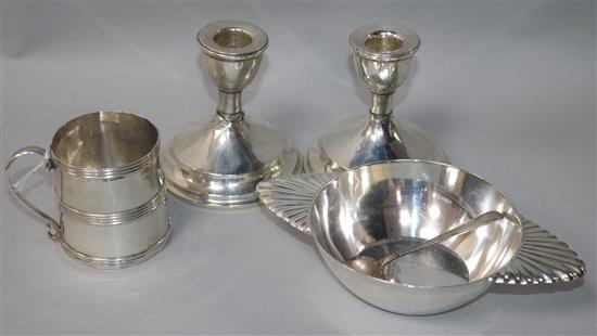 A French silver quaich, a pair of silver mounted dwarf candlesticks (a.f.) and two other items.